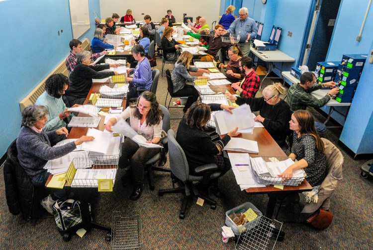 AUGUSTA, ME - DECEMBER 13: The second Congressional district recount continues on Thursday December 13, 2018 at the Elkins Building in Augusta. (Staff photo by Joe Phelan/Staff Photographer)