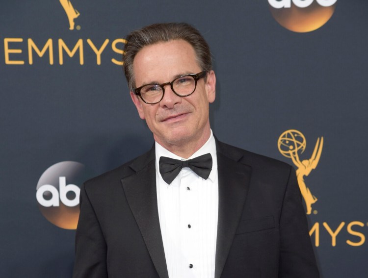 FILE - Peter Scolari arrives at the 68th Primetime Emmy Awards in Los Angeles on Sept. 18, 2016. Scolari, a versatile character actor whose television roles included a yuppie producer on “Newhart” and a closeted dad on “Girls” and who was on Broadway in “Hairspray” and “Wicked,” died Friday morning in New York after fighting cancer for two years, according to Ellen Lubin Sanitsky, his longtime manager. He was 66. (Photo by Richard Shotwell/Invision/AP, File)