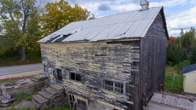 A barn is part of the Lake Auburn Community Center property being put up for sale this week.