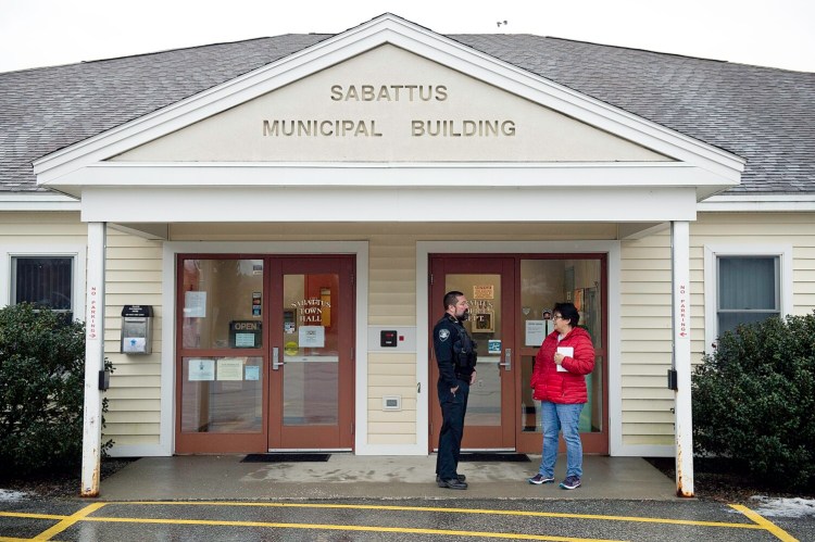 Sabattus police Officer Rich Stanton talks with Carole Spencer on Thursday outside the Sabattus Police Department. Spencer said she is very frustrated with the lack of investment the town is putting into its Police Department. "We need these guys," Spencer said of officers. "I like law and order. We are going to have people take things into their own hands if we do not act. I don't know what is going to happen to our cops, but it doesn't look good," said the lifelong town resident.