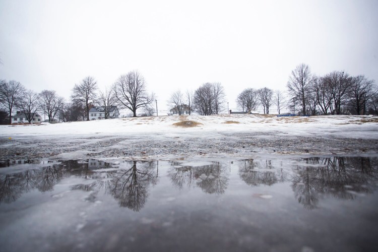 Payson Hill, a popular sledding hill in Portland, is empty on Sunday.