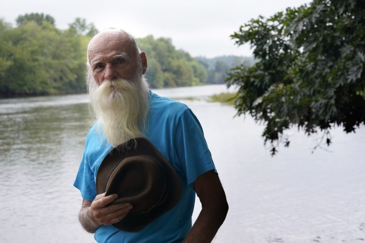 David Lidstone, 81, shown in August, has been charged with trespassing on the same property in New Hampshire he was ordered to leave last year. 