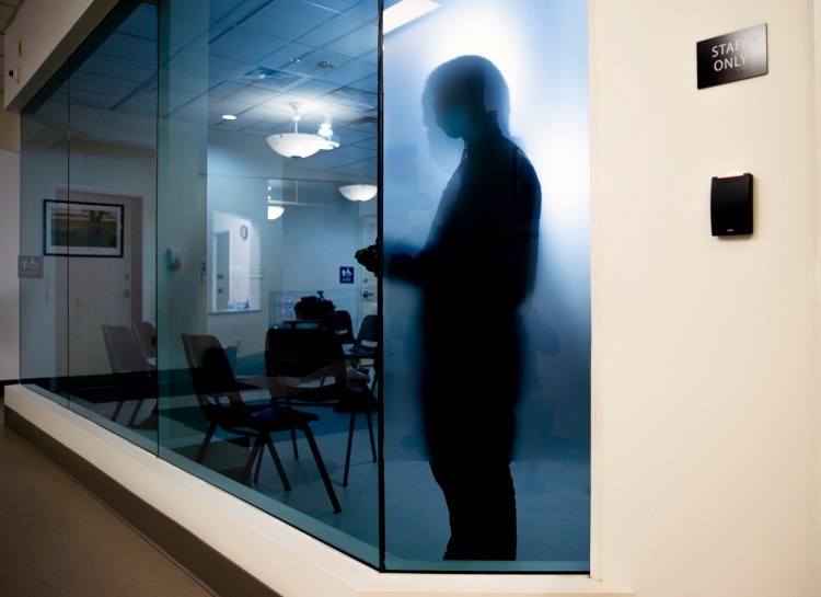 A 38-year-old asylum seeker from Angola, who asked to be identified as Patrick,  is photographed at Portland's Health & Human Services Department on Thursday. 