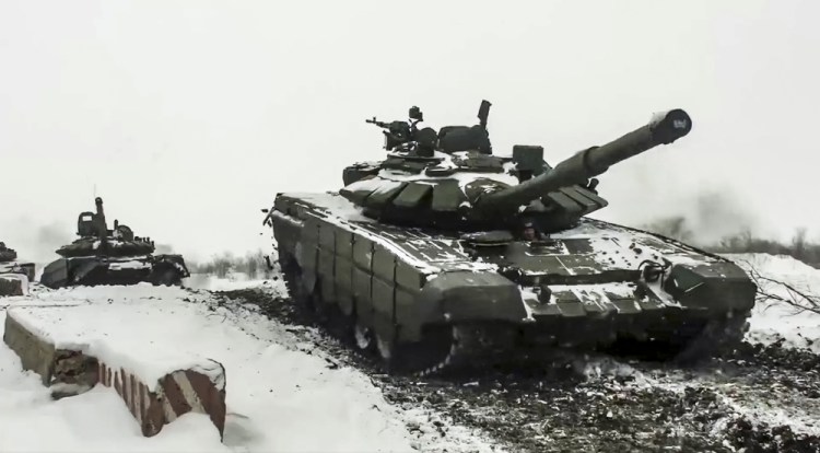Russian tanks roll during a military exercise Jan. 26 at a training ground in Rostov region. 

