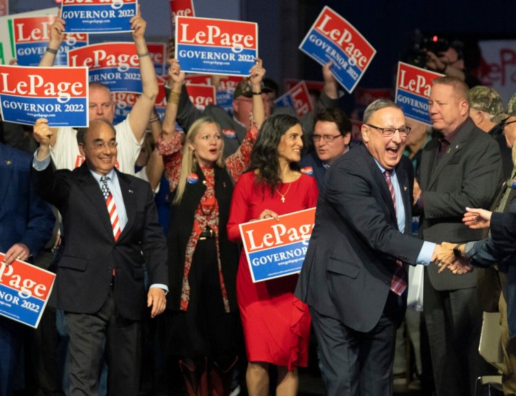 Former Maine govenor and gubernatorial candidate Paul LePage greets supporters on his way in to speak during the Maine Republican Convention at the Augusta Civic Center on Saturday. 